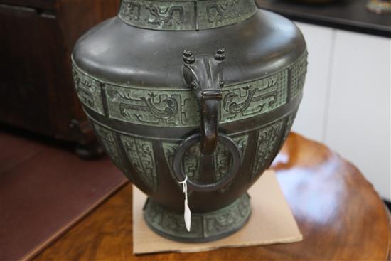 A large Chinese or Japanese archaistic bronze jardiniere, 19th century, height 53cm